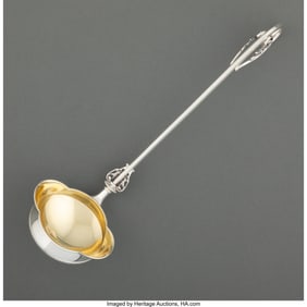 74316: A Wood & Hughes Partial Gilt Silver Soup Ladle,