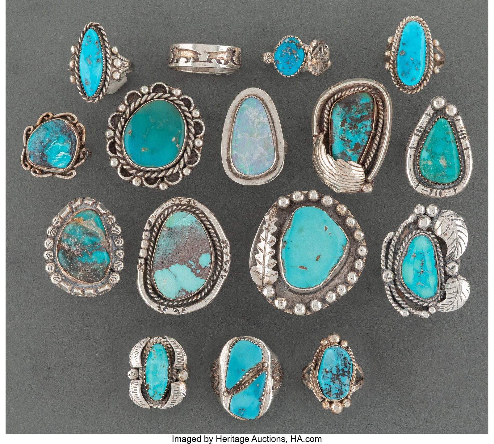 Sixteen Southwest Style Rings c. 2000 with var: Sixteen Southwest Style Rings c. 2000 with various stamps, silver, turquoise, opal, lapis lazuli Sizes: ranging from 5 &frac12; to 10 HID03101062020 ©