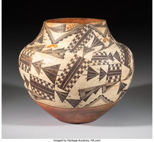70081: An Acoma Polychrome Storage Jar  c. 1880  clay,