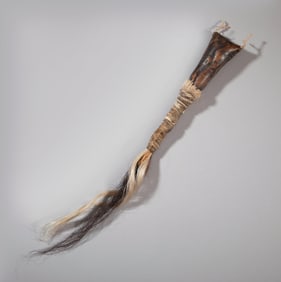 70152: A Navajo Buffalo Hide Rattle  c. 1890  wood, buf