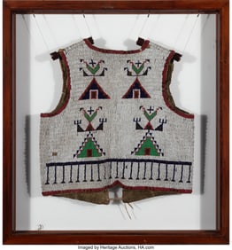 70162: A Sioux Pictorial Beaded Hide Vest  c. 1890  hid