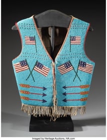 70165: A Blackfoot Pictorial Beaded Hide Vest  c. 1915