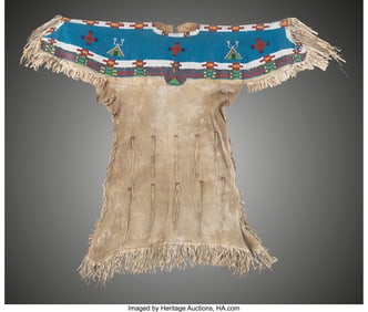 70166: A Sioux Beaded Hide Dress  c. 1920  hide, metal