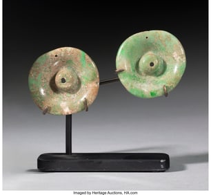 70248: A Pair of Maya Earflares  Maya Regions, Mesoamer