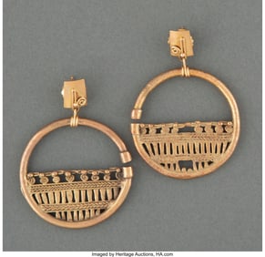 70264: A Pair of Zenu Gold Earrings  Colombia, c. 700 -