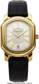 54013: Tiffany Mark Coupe 18k Yellow Gold Automatic Cal
