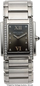 54077: Patek Philippe Lady's Stainless Steel Wristwatch