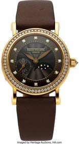 54078: Patek Philippe, Ref. 4858J Gold & Diamond Lady's