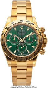 54133: Rolex, Ref. 116508 Green Dial 18k Gold "John May