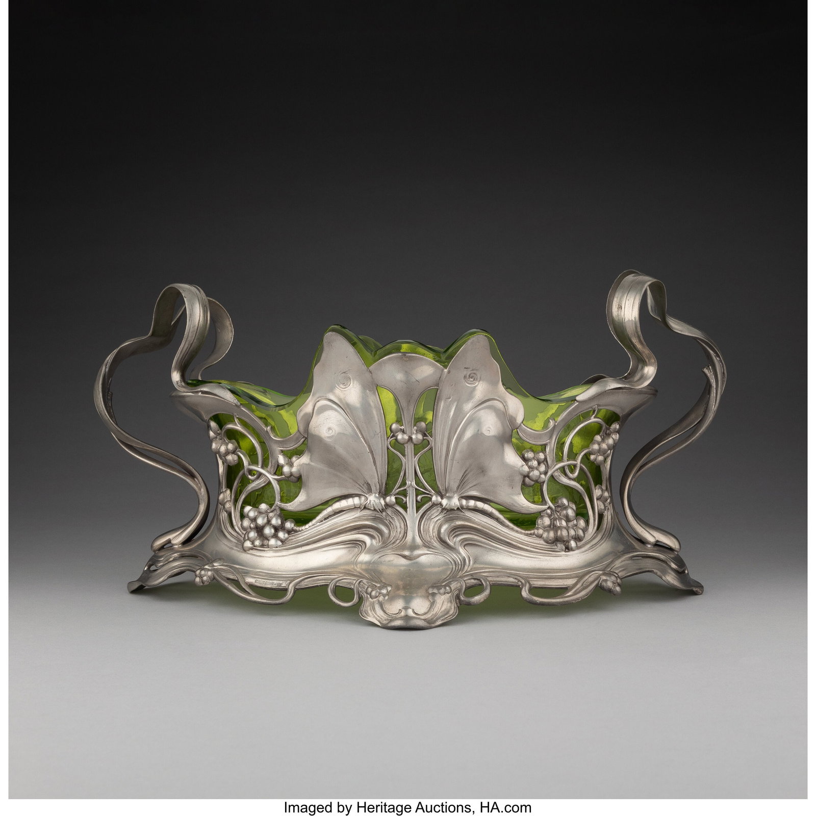 A Württembergische Metallwarenfabrik Silver-Pla: A Württembergische Metallwarenfabrik Silver-Plated Flower Dish with Butterfly Motif, circa 1900 Marks: WMF, EP, I/O, OX 7-3/8 x 14-1/2 x 10 inches (