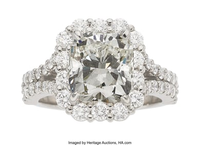 55126: Diamond, Platinum Ring Stones: Cushion-shaped d
