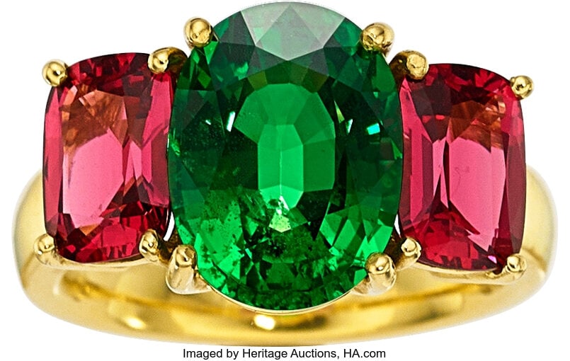 Tsavorite Garnet, Spinel, Gold Ring Stones: Ova: Tsavorite Garnet, Spinel, Gold Ring Stones: Oval-shaped tsavorite garnet weighing 5.11 carats; rectangular cushion-shaped spinels weighing a total of approximately 2&peri