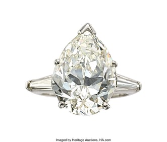 55299: Diamond, Platinum Ring Stones: Pear-shaped diam