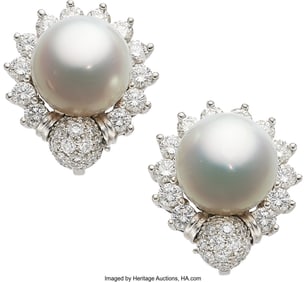 55345: South Sea Cultured Pearl, Diamond, Platinum Ear