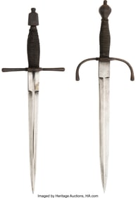 40016: Lot of Two (2) Left Hand Daggers. Comprising: