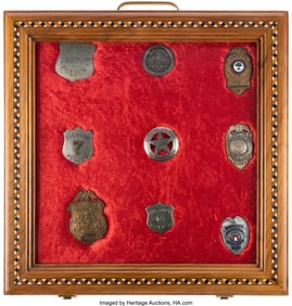 40192: Group of Nine Twentieth Century Police Badges.