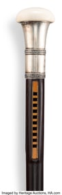 63081&colon; A Silver-Mounted and Ebonized Wood Cane&colon; Harmoni