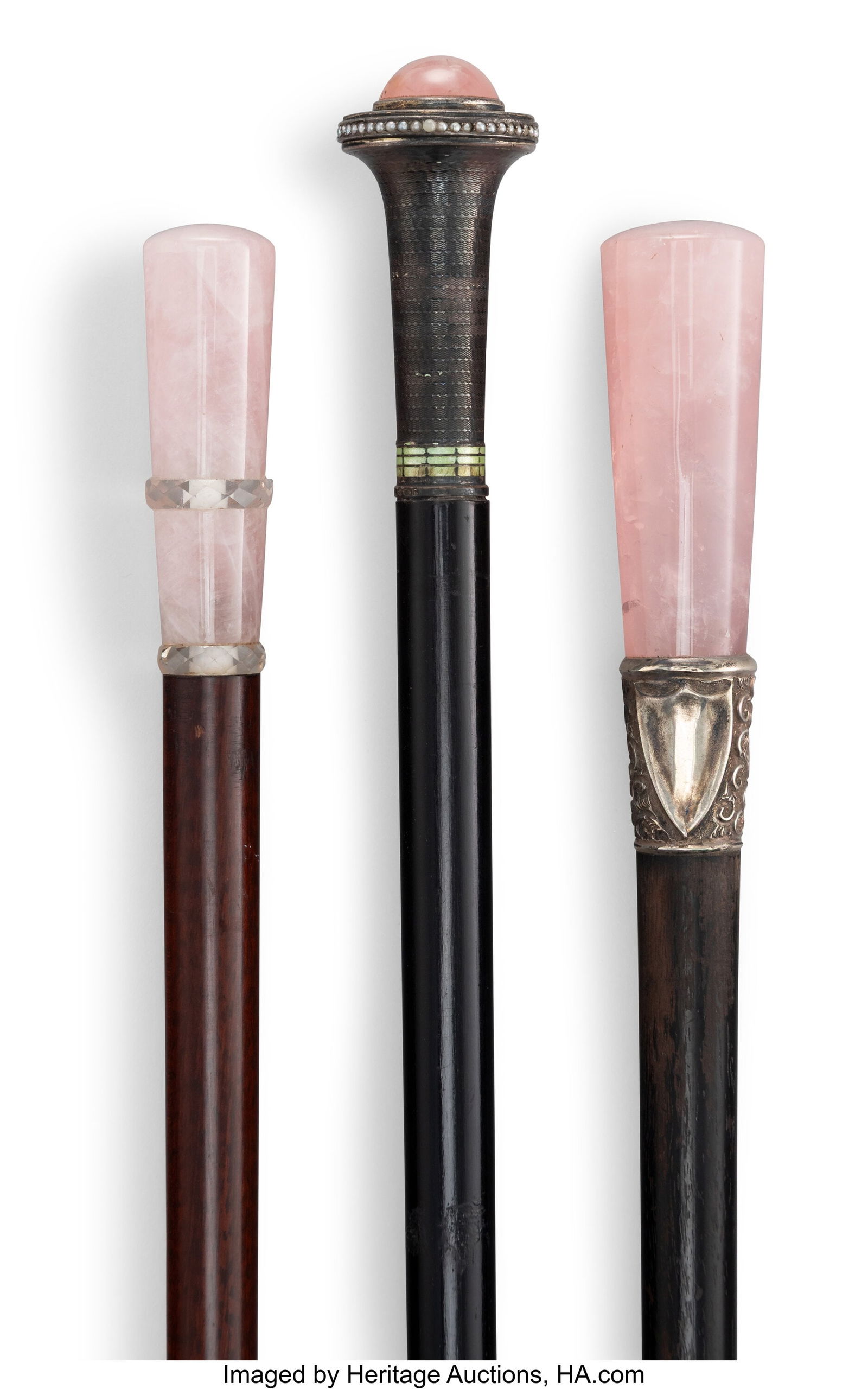 A Set of Three Rose Quartz, Glass, and Silver-Mo: A Set of Three Rose Quartz, Glass, and Silver-Mounted Carved Wood Canes, early 20th century Marks to one: G.V & CO., 925, U, GMS, 950&