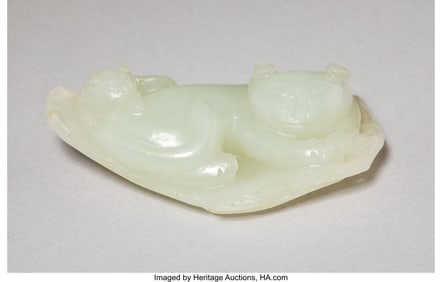 28114: A Chinese Carved White Jade Figural Group of Cat