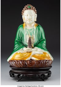 28131: A Chinese Famille Verte Glazed Figure of Seated