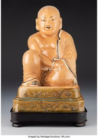 28146: A Chinese Cafe-au-Lait Glazed Figure of Buddha,