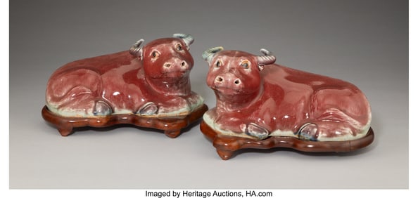 28159: A Pair of Chinese Oxblood-Glazed Recumbent Buffa