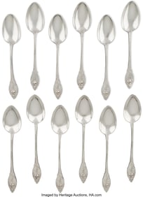 69050: A Set of Twelve Fabergé Silver Dessert Spoons i