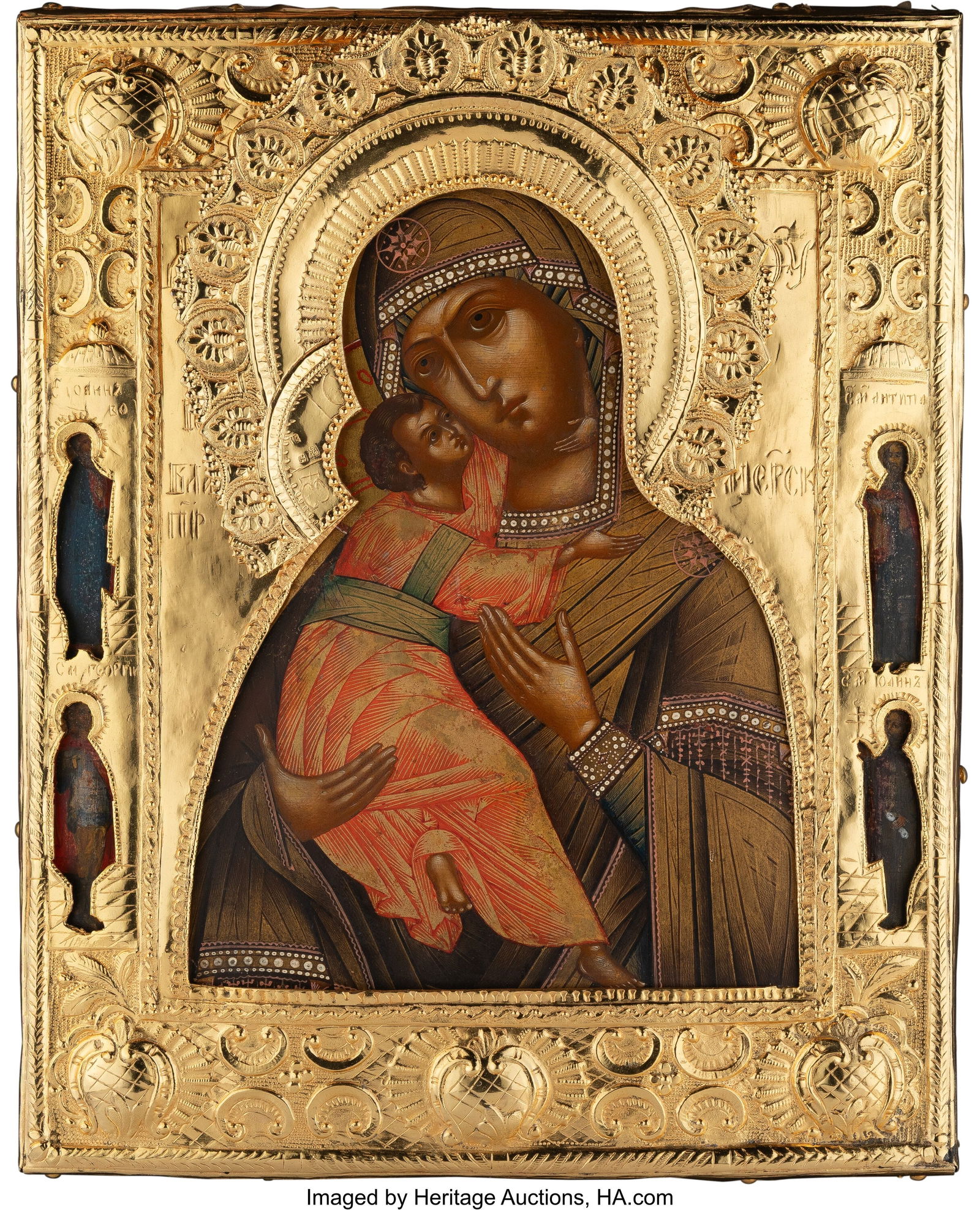 A Russian Icon of the Mother of God of Vladimir: A Russian Icon of the Mother of God of Vladimir with Attendant Saints Marks of НГ likely for Nikolai Yegorovich Grachev, Moscow, 19th century 13-1/2 x 10-7/8 inches (3