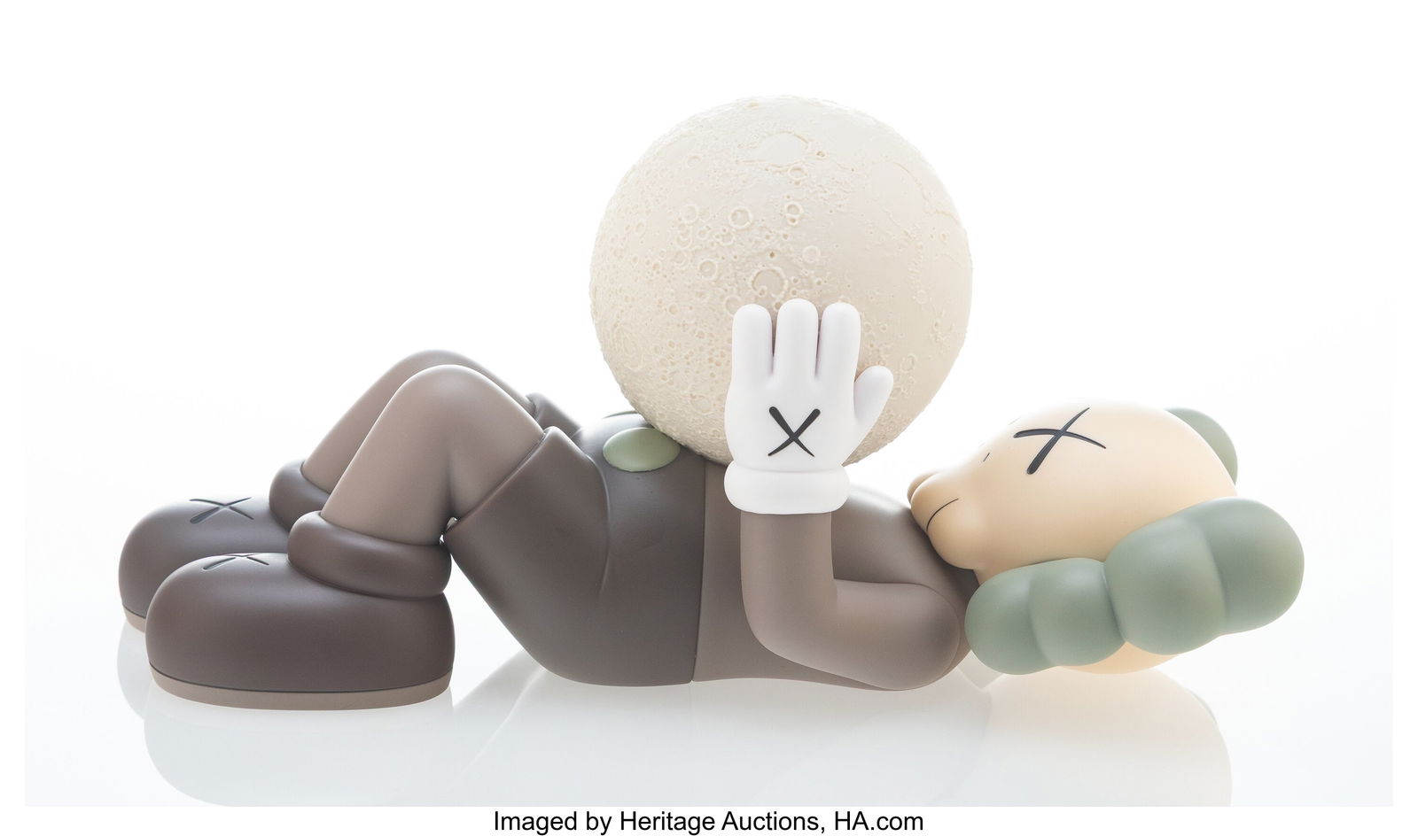 KAWS (b. 1974) Holiday: Shanghai (Brown), 2024 P: KAWS (b. 1974) Holiday: Shanghai (Brown), 2024 Painted cast vinyl 9-1/2 x 4-1/2 x 4-1/2 inches (24.1 x 11.4 x 11.4 cm)