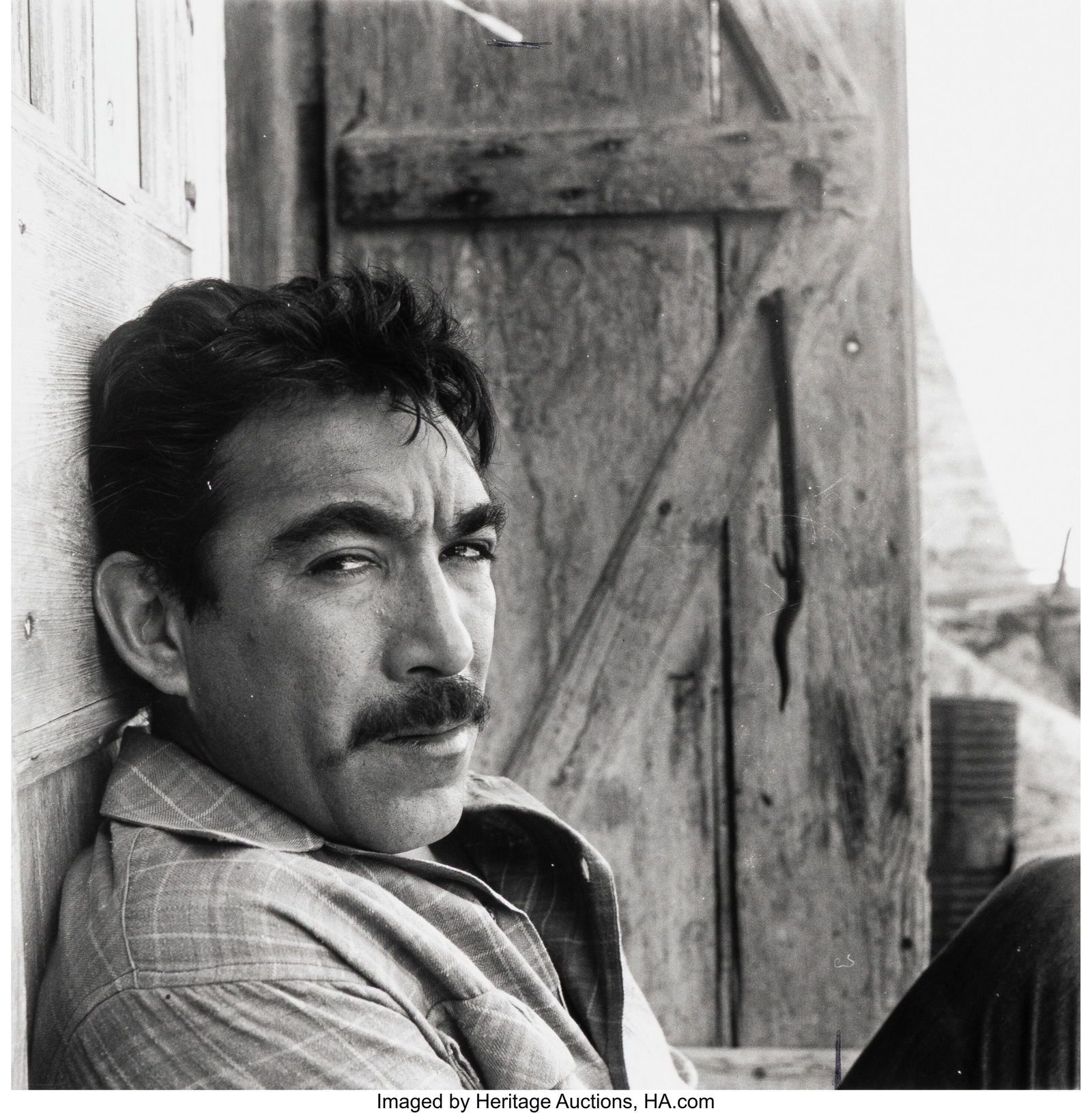 Sam Shaw (American, 1912-1999) Anthony Quinn on: Sam Shaw (American, 1912-1999) Anthony Quinn on the set of Viva Zapata, 1952 Gelatin silver print, printed later 7-1/2 x 7-1/4 inches (19.1 x 18.