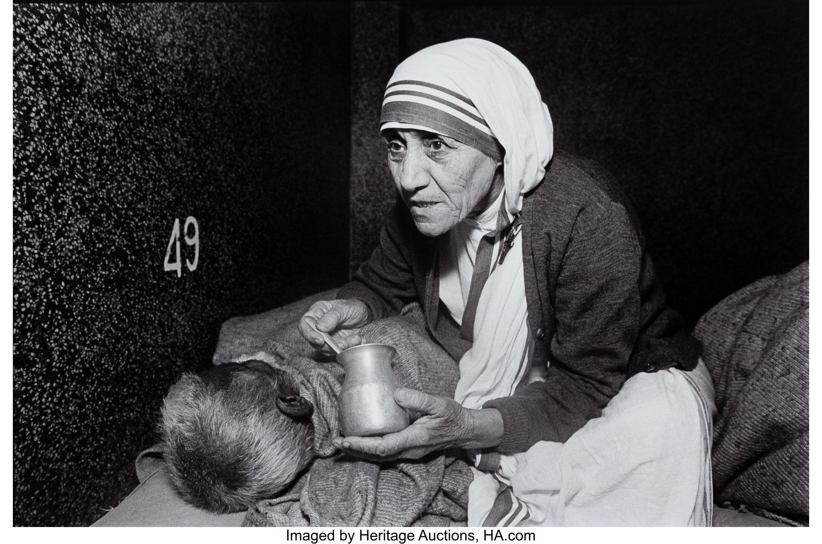 Mary Ellen Mark (American, 1941-2015) Mother Ter: Mary Ellen Mark (American, 1941-2015) Mother Teresa Feeding a Man at the Home for the Dying, 1980 Gelatin silver print 8-5/8 x 13-1/8 inches (21.9 x 33&period