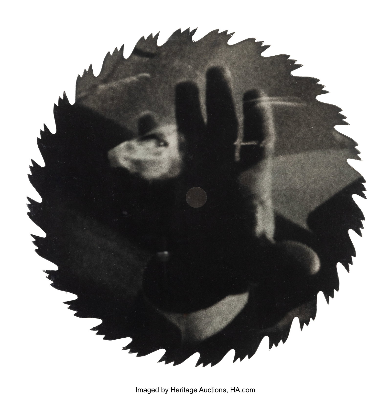 John Schlesinger (b. 1955) Untitled (Hand/Eye) f: John Schlesinger (b. 1955) Untitled (Hand/Eye) from Sawblades series, 1992 Photograph on circular saw blade 18-3/4 inches (47.6 cm) (diam