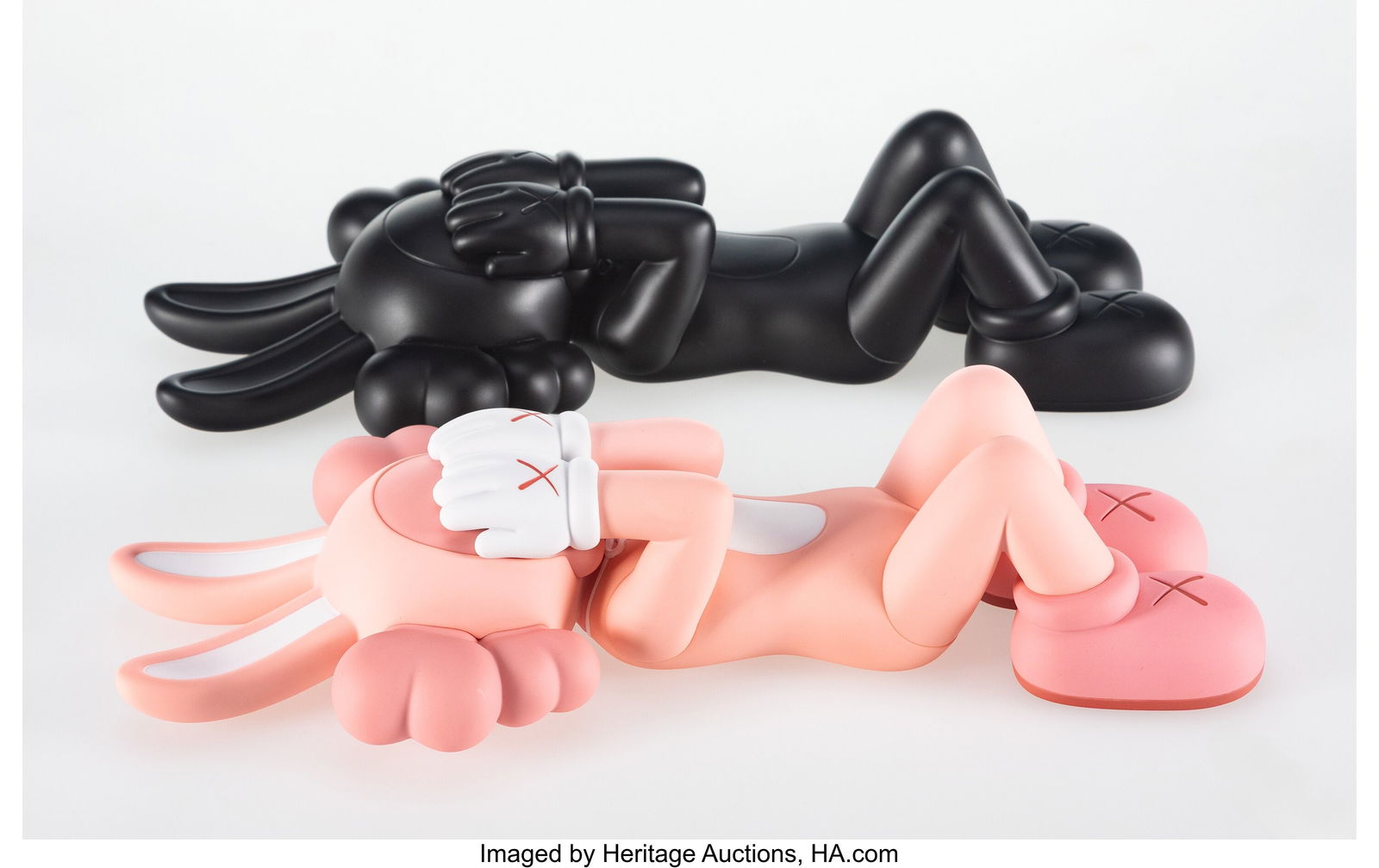 KAWS (b. 1974) Holiday: Indonesia (two works), 2: KAWS (b. 1974) Holiday: Indonesia (two works), 2023 Painted cast vinyl 2-1/2 x 4-1/2 x 11-1/2 inches (6.3 x 11.4 x 29.2 cm&