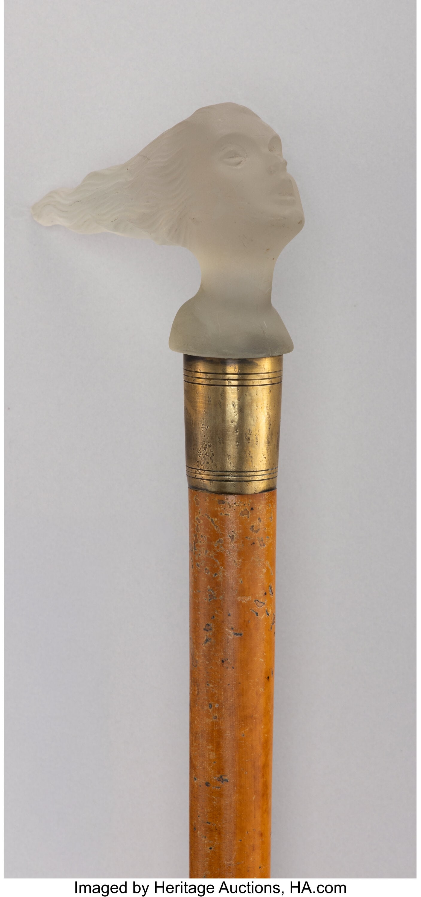 A Frosted Glass and Carved Wood Cane Attributed: A Frosted Glass and Carved Wood Cane Attributed to Corning Glass Works, circa 1900 36 x 4-3/4 x 1-1/4 inches (91.4 x 12.1 x 3.2 cm) HID03101062020 © 2
