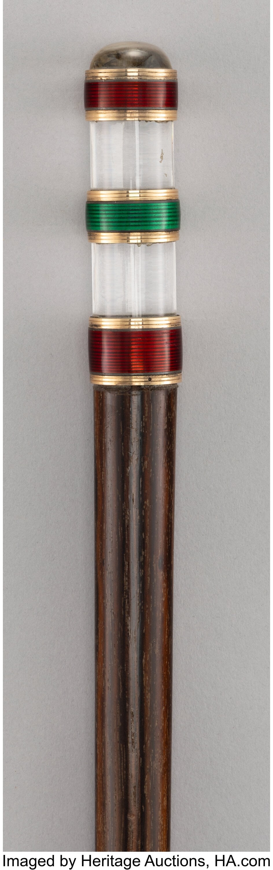 A Glass, Enameled, and Carved Wood Cane 38-5/8 x: A Glass, Enameled, and Carved Wood Cane 38-5/8 x 1 inches (98.1 x 2.5 cm) HID03101062020 © 2026 Heritage Auctions | All Rights Reserved www.HA&