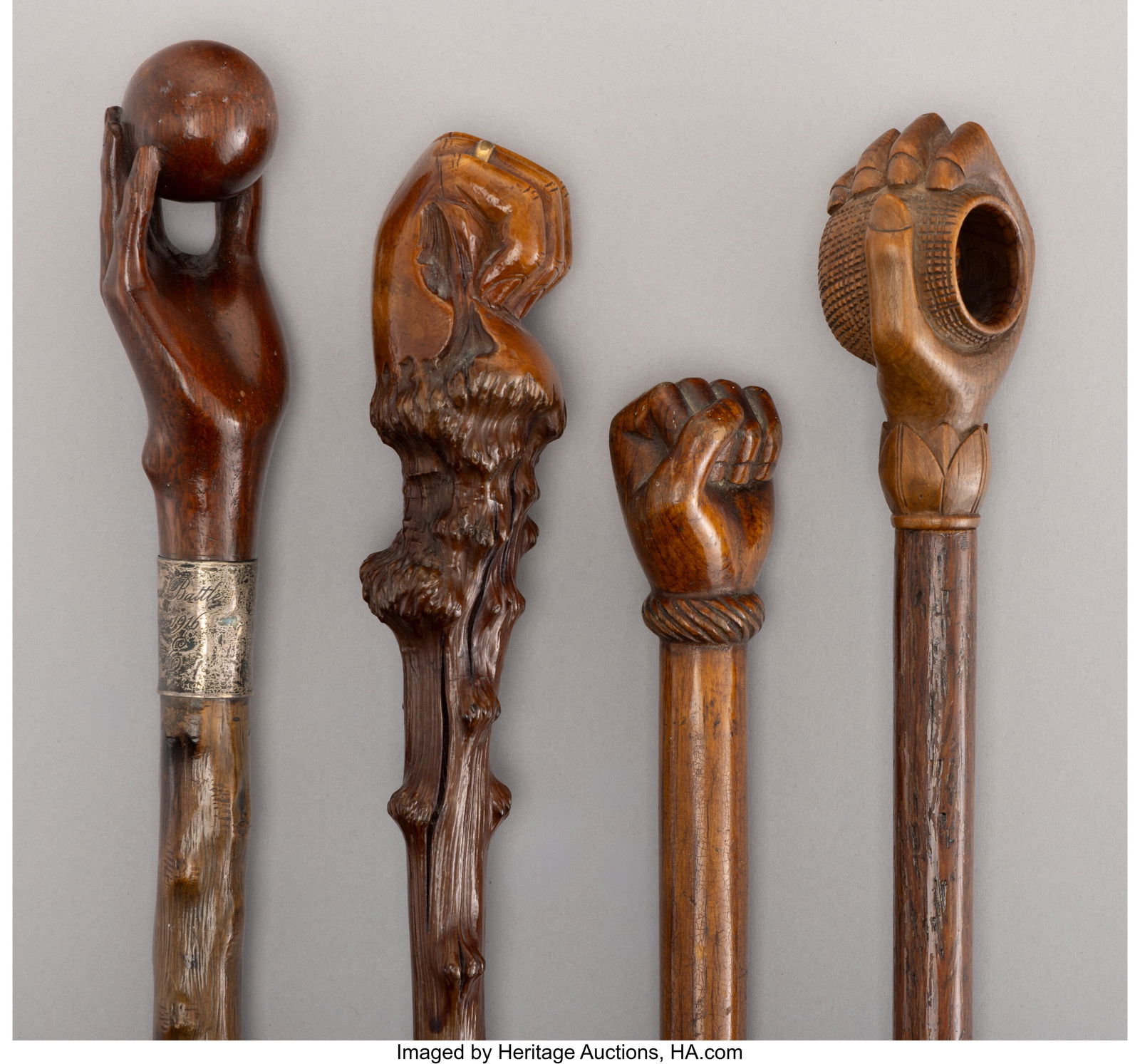 A Group of Four Carved Wood Walking Canes, One w (1 of 5)