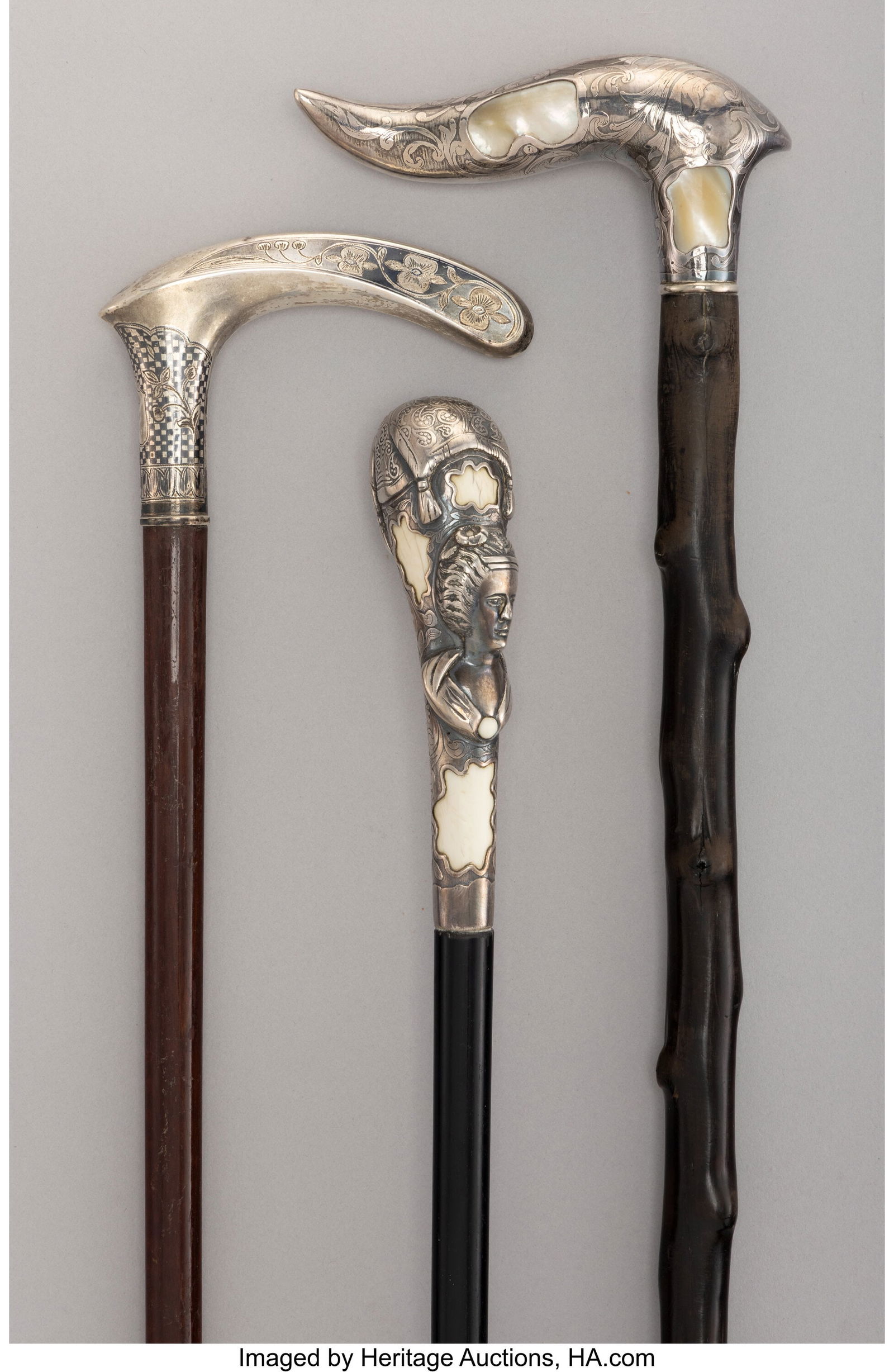 A Collection of Three Silver-Mounted Canes 39 x (1 of 4)