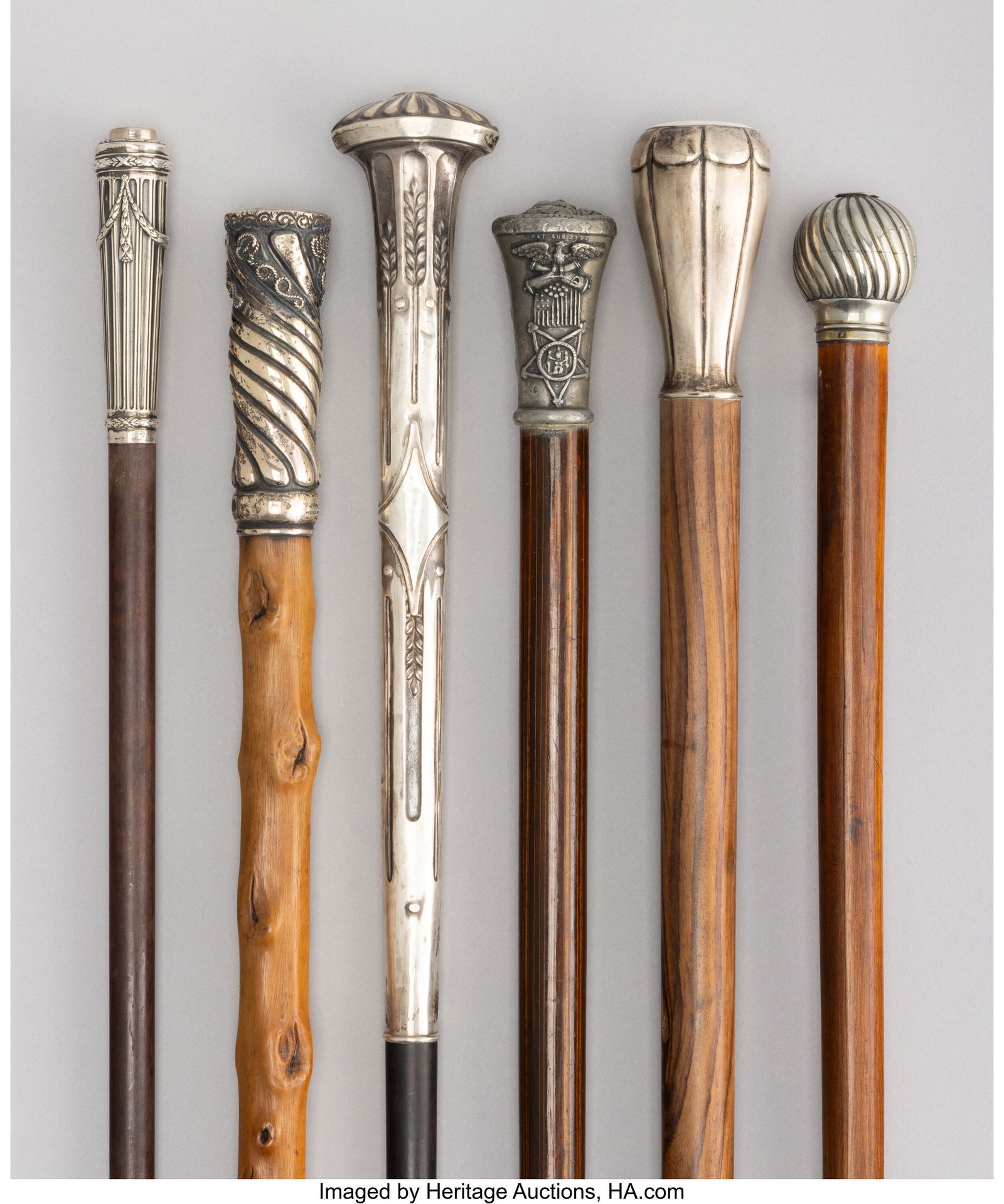 Six Silver and Metal-Mounted, Carved Wood, and B: Six Silver and Metal-Mounted, Carved Wood, and Bamboo Canes, circa 1892 and later Marks to one: R.F.S & CO, STERLING 37-3/4 x 2-1/8 x 1-1/8