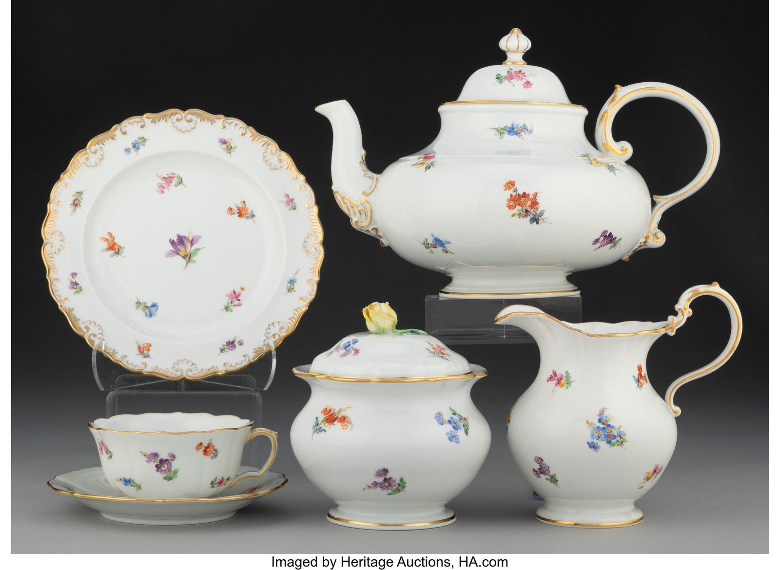 A Thirty Nine-Piece Meissen Enameled Porcelain D: A Thirty Nine-Piece Meissen Enameled Porcelain Dessert Service for Twelve, mid-20th century Marks: (crossed swords in blue underglaze) 7 x 10-1/2 x 6-5/8 inches (17&