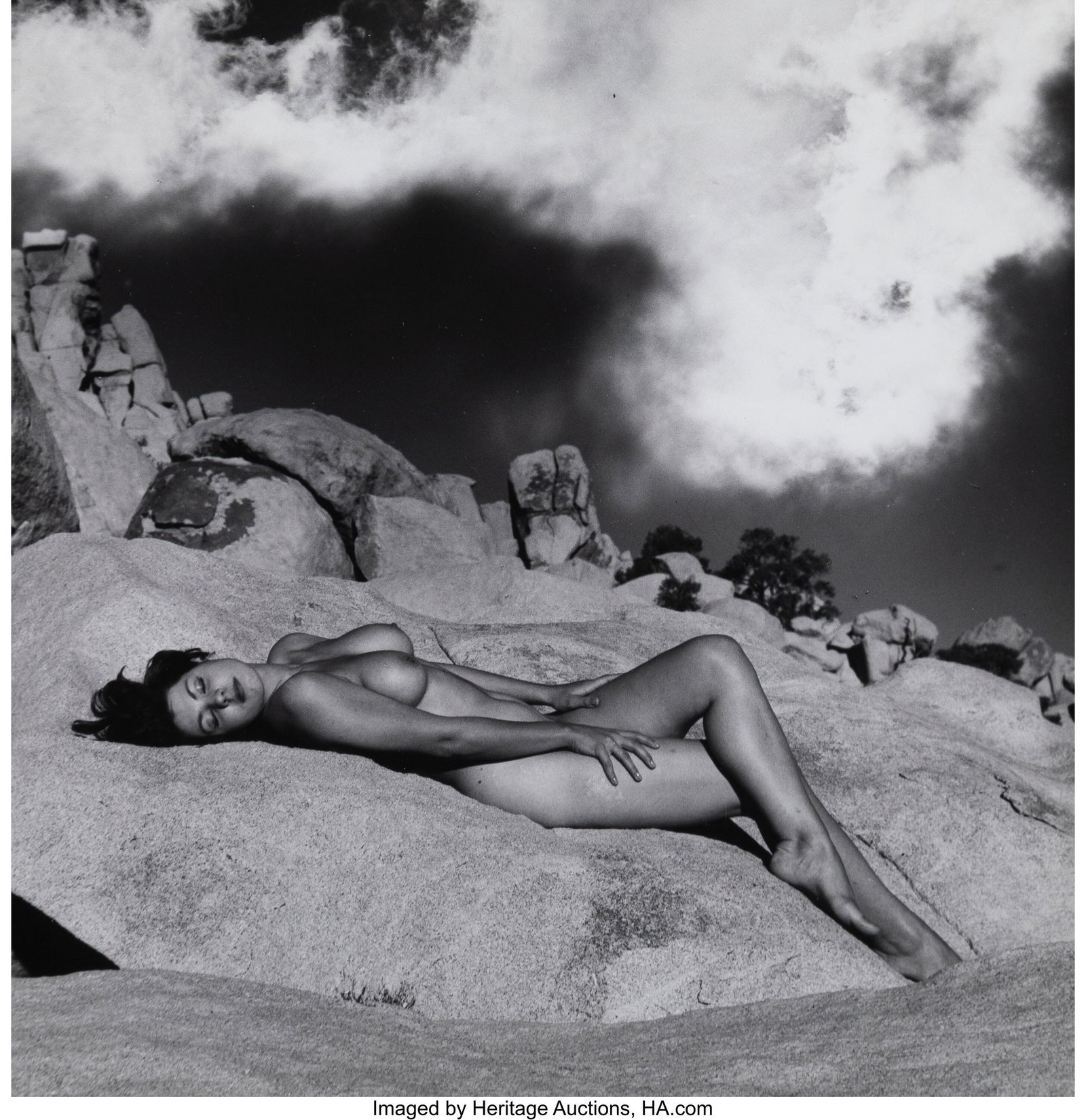 Andre De Dienes (Hungarian, 1913-1985) Nude Layi: Andre De Dienes (Hungarian, 1913-1985) Nude Laying on Rocks, circa 1960s Gelatin silver print, ferrotpyed 10-1/4 x 10 inches (26.0 x 25.4 cm) &l