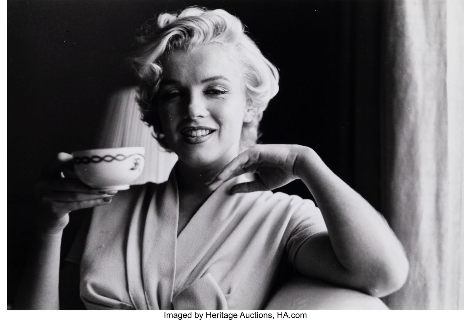 Sam Shaw (American, 1912-1999) Marilyn Monroe Ho: Sam Shaw (American, 1912-1999) Marilyn Monroe Holds a Cup of Tea at the Hotel St. Regis, 1954 Gelatin silver print, printed later 9 x 13-1/4 inches (22&peri