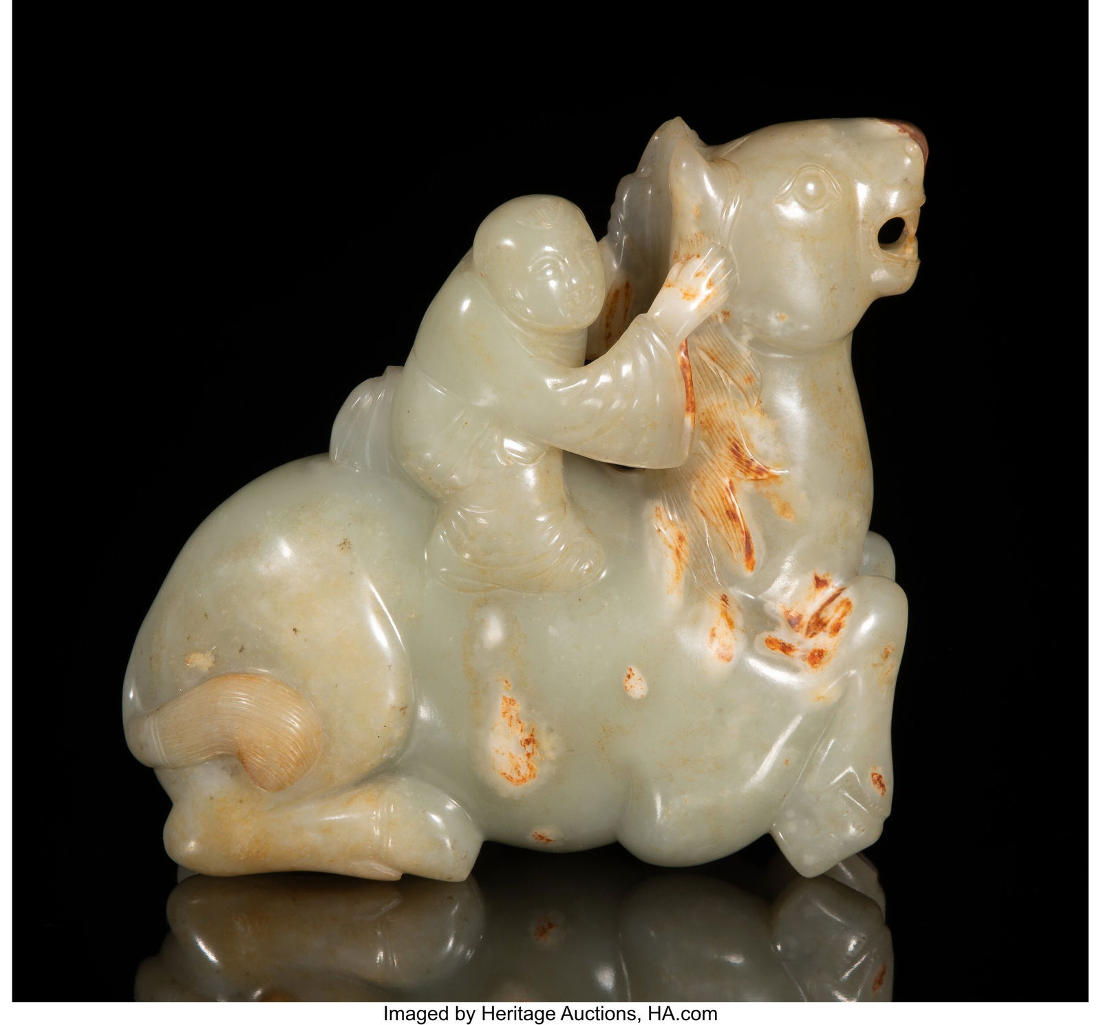 A Chinese Russet and Celadon Jade Carving of a B: A Chinese Russet and Celadon Jade Carving of a Boy on a Horse, Qing dynasty or later 5-1/2 x 6-1/4 x 2-1/8 inches (14.0 x 15.9 x 5.4 cm) Property from