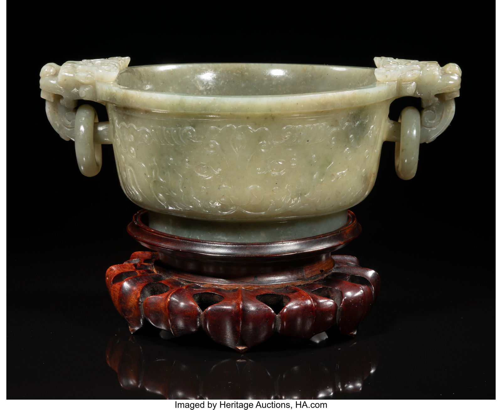A Chinese Carved Celadon Jade Double-Handled Was: A Chinese Carved Celadon Jade Double-Handled Washer, 20th century Marks: Incised four-character Qianlong mark 4 x 9 x 6-5/8 inches (10.2 x 22.9 x 16.8 cm&rpar