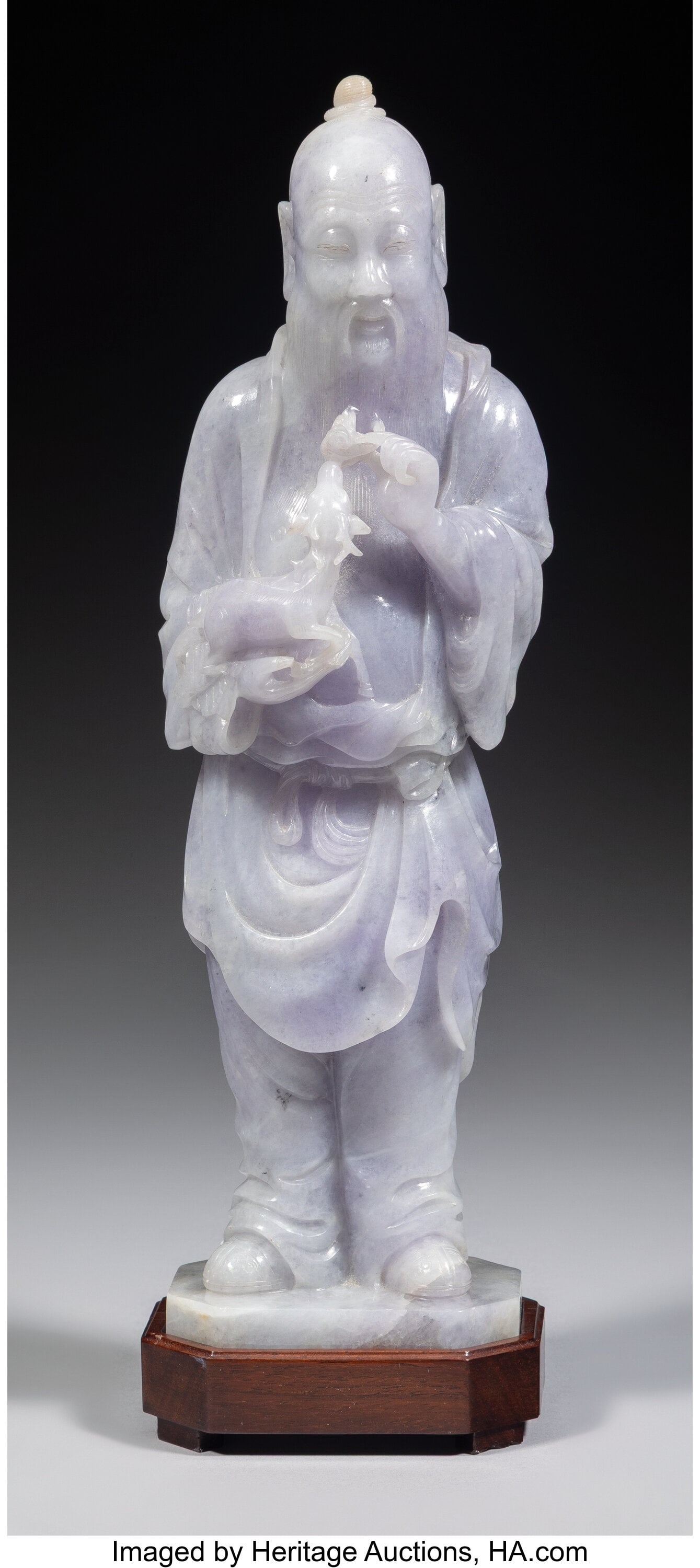 A Chinese Lavender Jadeite Standing Figure on St: A Chinese Lavender Jadeite Standing Figure on Stand, 20th century 12-3/4 x 0-3/4 x 3 inches (32.4 x 1.9 x 7.6 cm) (overall) Property from the col
