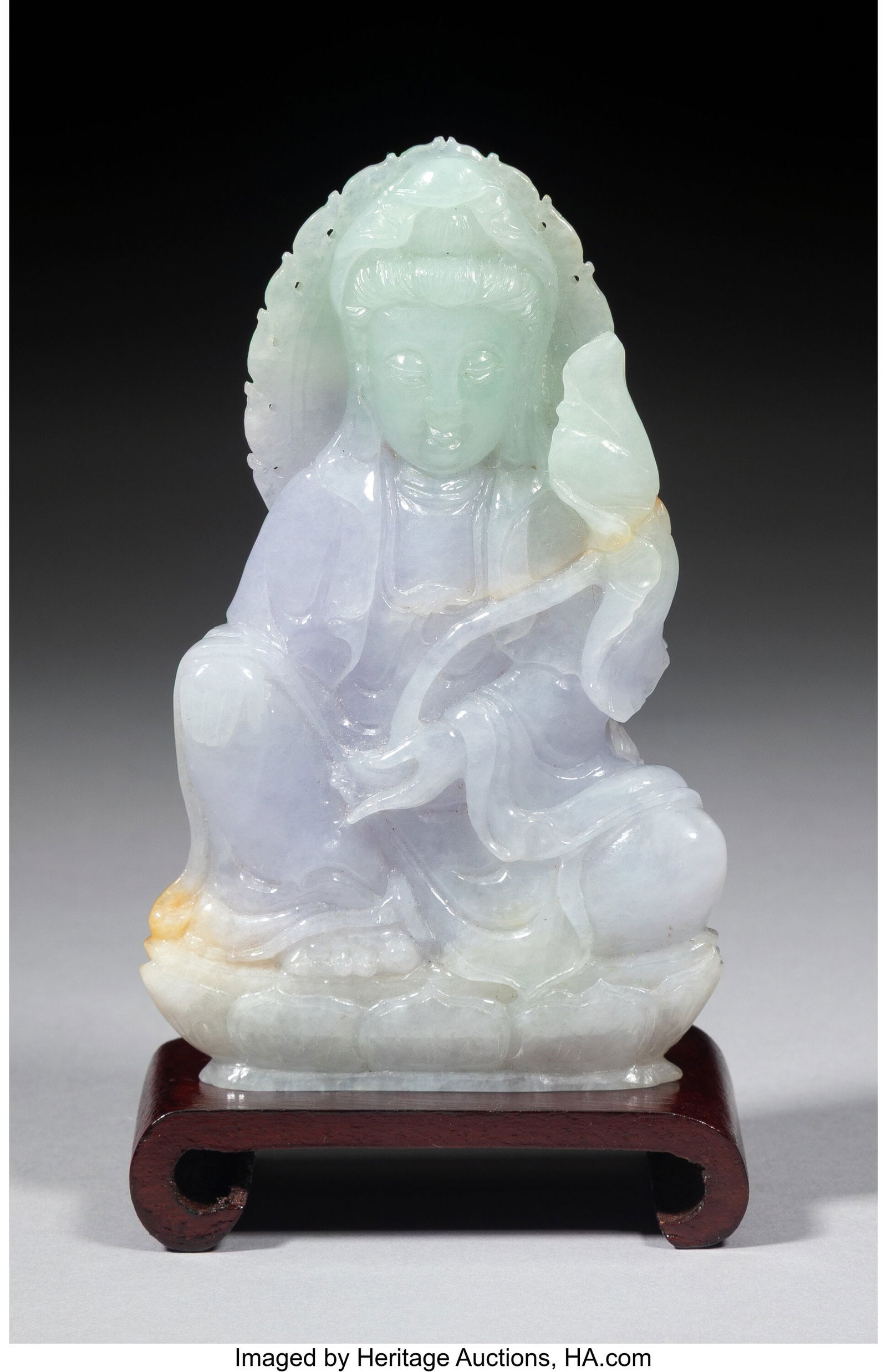 A Chinese Carved Lavender Jadeite Seated Buddha, (1 of 2)