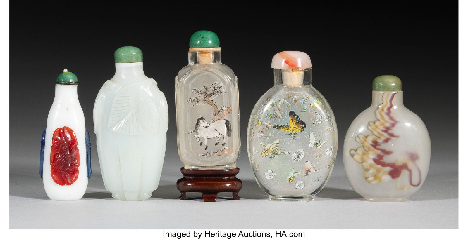A Group of Five Glass Snuff Bottles 3-1/4 x 1-5/: A Group of Five Glass Snuff Bottles 3-1/4 x 1-5/8 x 0-3/4 inches (8.3 x 4.1 x 1.9 cm) (tallest) HID03101062020 © 2026 Heritage Auctions |