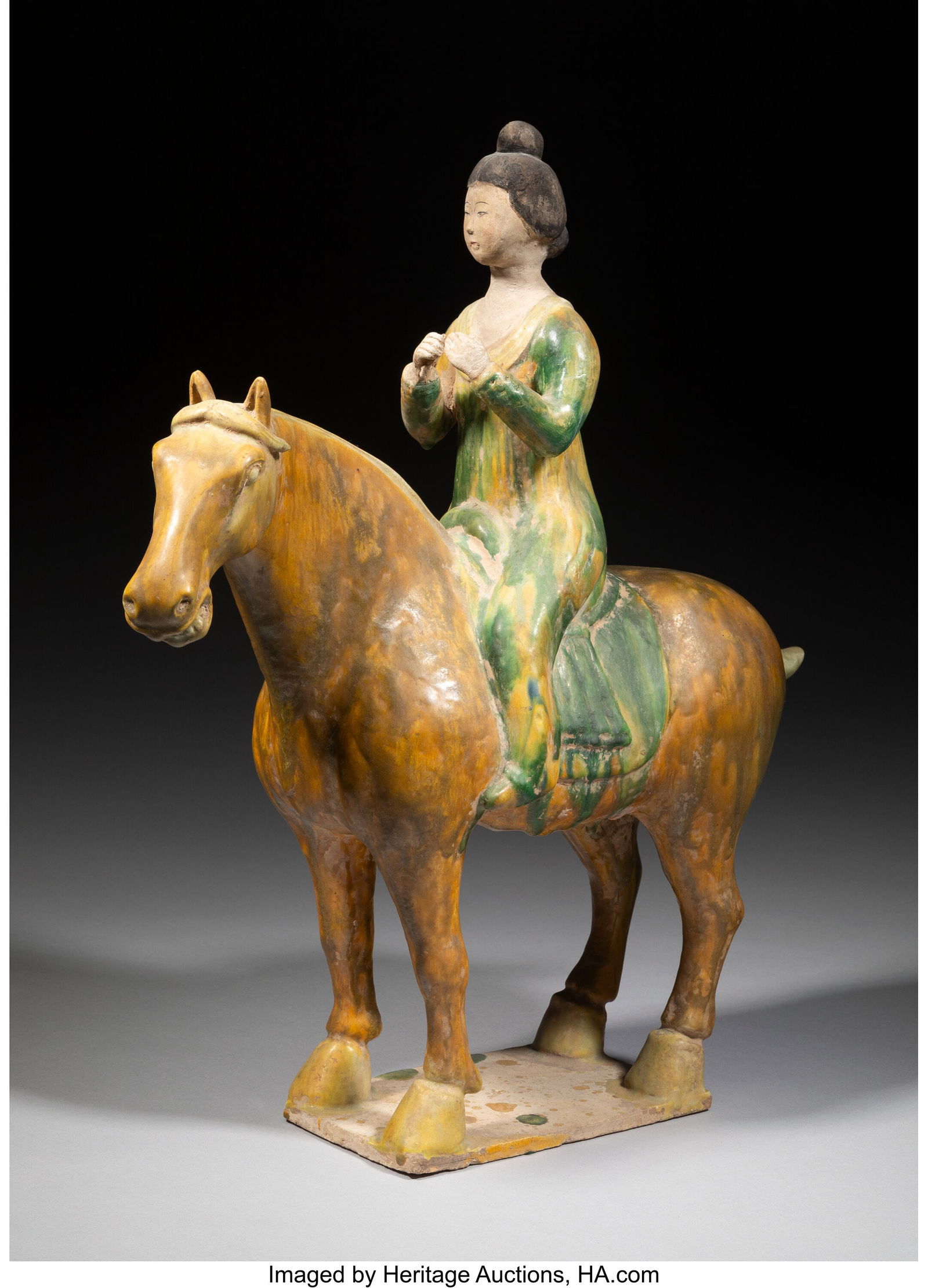 A Tang-Style Sancai-Glazed Figure of a Maiden on (1 of 3)