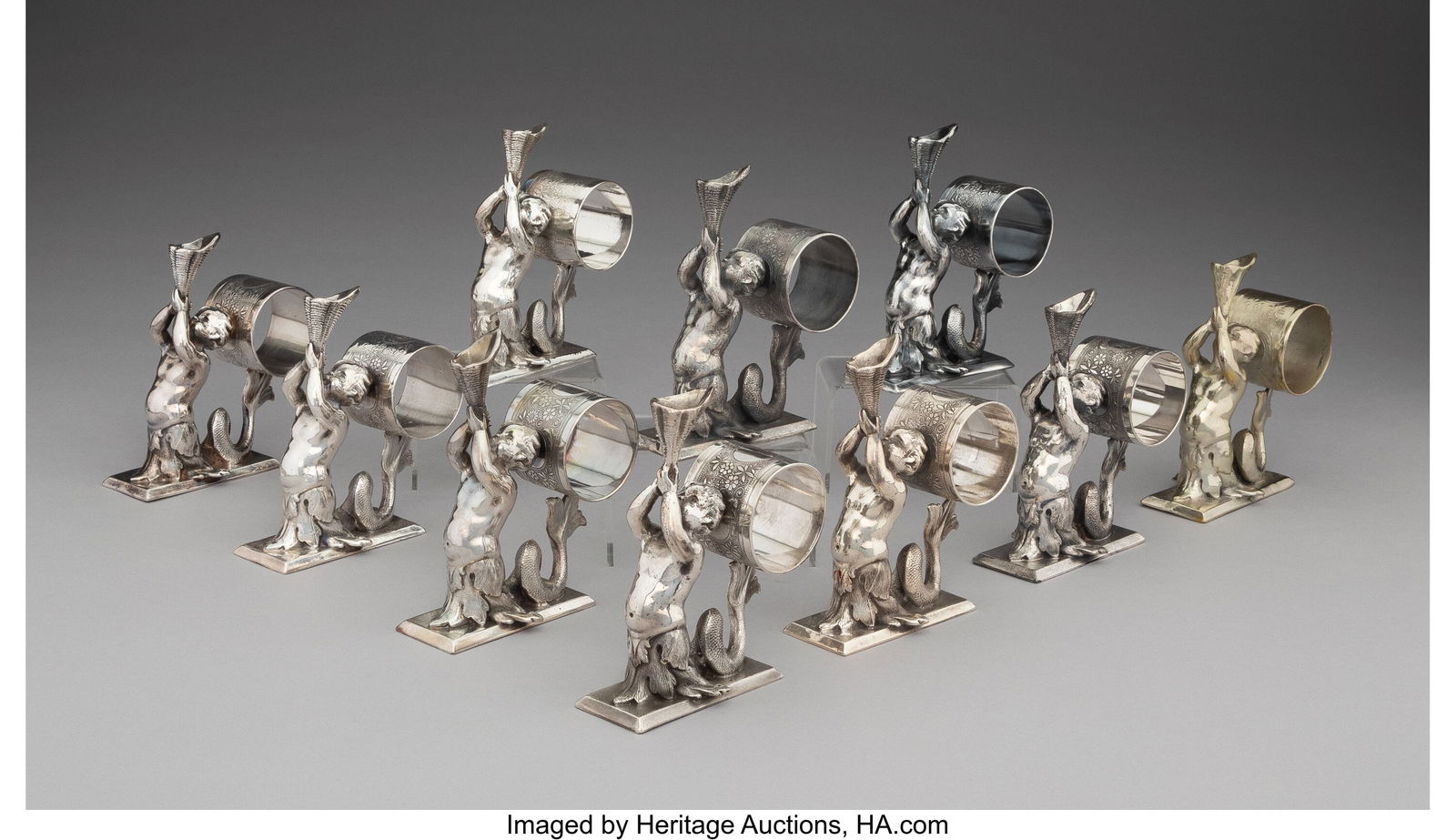 A Group of Ten American Silver-Plated Napkin Hol: A Group of Ten American Silver-Plated Napkin Holders, mid-19th century Marks: MERIDEN, B. COMPANY, 201 5-1/8 x 2-1/8 x 4-3/8 inches (13.0 x