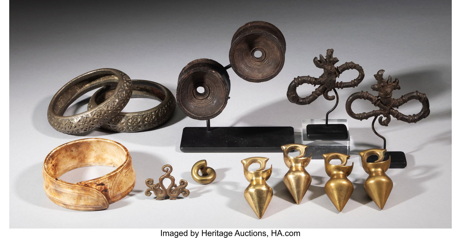 A Group of Thirteen Indonesian Ornaments In (1 of 2)