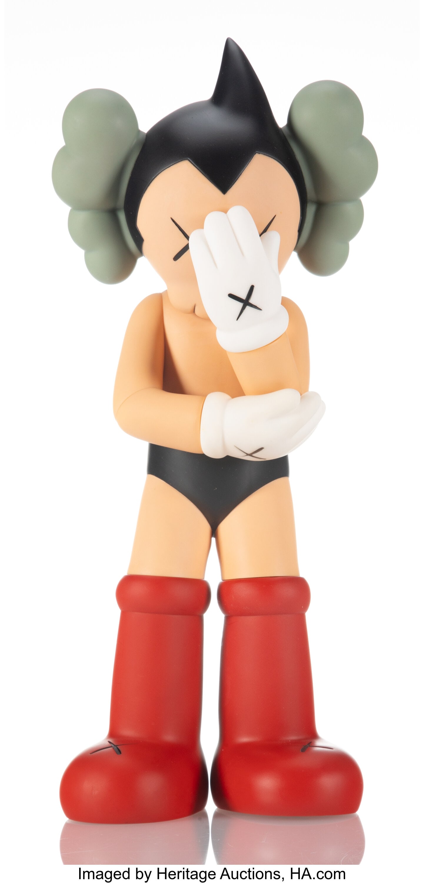 KAWS (b. 1974) Astro Boy, 2012 Painted cast viny (1 of 3)